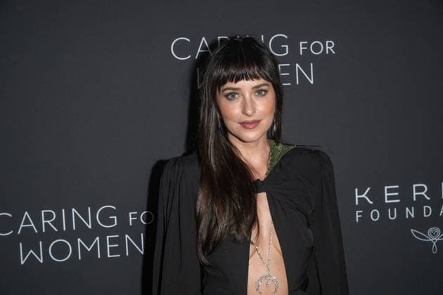 September 10, 2026, New York, New York, United States: Dakota Johnson attends.Celebrities attend the Kering Foundation s Caring For Women Dinner at The Pool on September 10, 2026 in New York City. New York United States  - ZUMAs197 20260910_aaa_s197_815 Copyright: xRonxAdarx