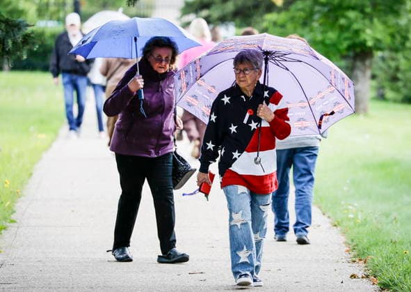 September 11, 2026, Winnipeg, Mb, Canada: Mae Streich joins other people to participate in the 25th Annual 9 11 Memorial Service at the International Peace Garden in Boissevain, Man., Friday, Sept. 11, 2026. Winnipeg Canada  - ZUMAc35_ 20260911_zaf_c35_104 Copyright: xJohnxWoodsx