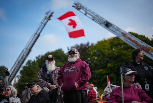 September 11, 2026, Surrey, Bc, CANADA: People listen during the Northwest 9 11 Memorial ceremony at the Peach Arch monument on the Canada-U.S. border between Surrey, B.C., and Blaine, Wash., in Surrey, B.C., on Friday, Sept. 11, 2026. Surrey CANADA - ZUMAc35_ 20260911_zaf_c35_103 Copyright: xDarrylxDyckx