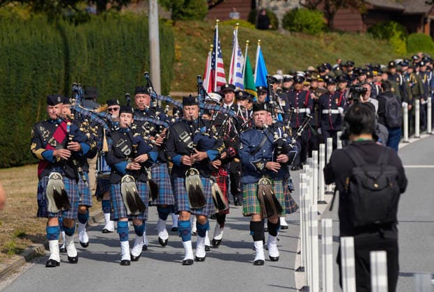 (260912) -- SURREY, Sept. 12, 2026 -- A pipe band marches during a commemoration marking the 25th anniversary of the 9 11 attacks in Surrey, British Columbia, Canada, Sept. 11, 2026. About 400 people from Canada and the United States gathered here on Friday to commemorate the 9 11 attacks on the 25th anniversary. (Photo by Xinhua) CANADA-SURREY-9 11 ATTACKS-COMMEMORATION LiangxSen 