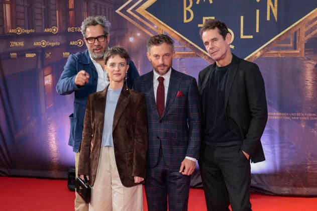 Achim von Borries, Liv Lisa Fries, Volker Bruch, and Tom Tykwer at the premiere of the fifth and final season of the TV series *Babylon Berlin* at the Naturstrom Openair Kino in Cologne, September 11, 2026 Foto:xR.xSchmiegeltx xFuturexImagex babylon_6927