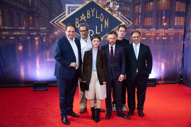 From left: Nathanael LIMINSKI, Head of the State Chancellery of North Rhine-Westphalia; Achim von BORRIES, director; Liv Lisa FRIES, actress; Volker BRUCH, actor; Tom TYKWER, director; Walid NAKSCHBANDI, Director of the Filmstiftung NRW; Red Carpet, Red Carpet Show, Arrival, premiere of the final season of *Babylon Berlin* on September 11, 2026, at the Na