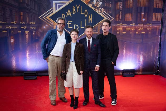From left: Achim von BORRIES, director; Liv Lisa FRIES, actress; Volker BRUCH, actor; Tom TYKWER, director; Red Carpet, Red Carpet Show, Arrival, Premiere of the final season of Babylon Berlin on September 11, 2026, at the Naturstrom Open-Air Cinema in Rheinau Harbor in Cologne,