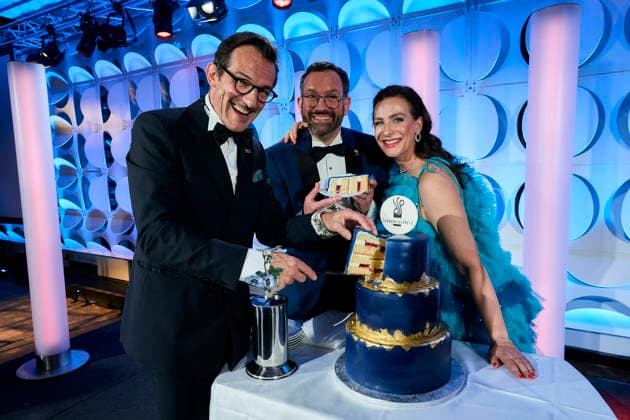2026 German Acting Award: Hans Werner Meyer, Nadine Heidenreich, and Christian Senger cut the cake on stage at the show celebrating 15 years of the German Acting Award and 20 years of the BFFS, Pullman Berlin Schweizerhof, September 11, 2026 Copyright: xEventpressx