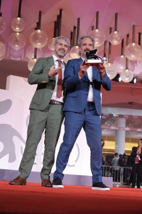 Venice 2026 Winners Photocall NB Peter Flaherty and Jesse Garrison pose with the Venice Immersive Achievement Award for Empire at Sea attending the Winners Photocall Red carpet as part of the 83th Venice International Film Festival at the Lido in Venice, Italy on September 12, 2026. Photo by Nasser Berzane ABACAPRESS.COM Venice Italy  Copyright: xBerzanexNasser ABACAx