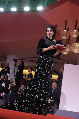 Venice 2026 Winners Photocall NB Laleh Marzban poses with the Orizzonti Best Actress Award for Moragheb (Falling House) attending the Winners Photocall Red carpet as part of the 83th Venice International Film Festival at the Lido in Venice, Italy on September 12, 2026. Photo by Nasser Berzane ABACAPRESS.COM Venice Italy  Copyright: xBerzanexNasser ABACAx
