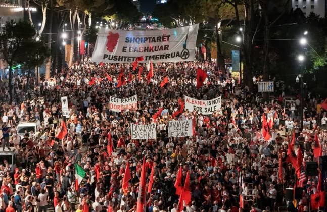 September 13, 2026, Tirane, Albania: TIRANA, ALBANIA Ã¢â‚¬? SEPTEMBER 12, 2026: Albanian citizens, civil society activists, students and members of the Albanian diaspora take part in a protest against a proposed luxury tourism development linked to U.S. investor Jared Kushner. Demonstrators displayed Albanian flags and banners calling for the cancellation of Law 21 2024, which they oppose in connection with the planned project. Tirane Albania - ZUMAq101 20260913_zna_q101_001 Copyright: xVlasovxSulajx