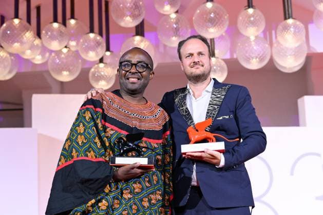 September 12, 2026, Venice, Rome, Italy: Auguste Bernard Kouemo Yanghu with the Lion of the Future Award, the Luigi De Laurentiis Venice Award for a Debut Film for the film House of the Wind, and the Orizzonti Special Jury Prize for the film House of the Wind, during the award-winning red carpet, 83rd Venice Film Festival. Venice, September 12, 2026 Venice Italy  - ZUMAa289 20260912_zia_a289_472 Copyright: xMariaxLauraxAntonellix xAgfx