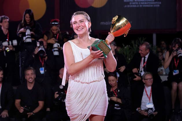 Mathilde Arcel poses with the Coppa Volpi for Best Actress Award for Woman Unknown at the Winners Photocall during the 83rd Venice International Film Festival at Sala Grande on September 12, 2026 in Venice, Italy.  VEN20260912809 RoccoxSpaziani