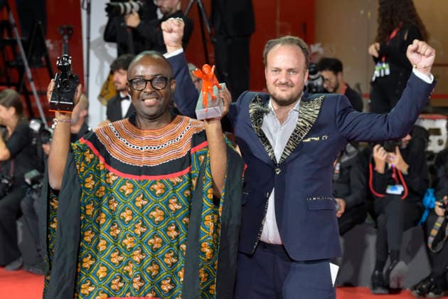 September 12, 2026, Venice Lido, Italy: Auguste Bernard Kouemo Yanghu (L) and Arthur Grec (R) pose with the Lion of the Future Luigi De Laurentiis Venice Award and the Orizzonti Special Jury Prize Award for a Debut Film for La maison du vent (House of the wind) at the Winners Photocall during the 83rd Venice International Film Festival at Sala Grande. Venice Lido Italy  - ZUMAs197 20260912_aaa_s197_553 Copyright: xMarioxCartellix