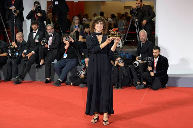 September 12, 2026, Venice Lido, Italy: May el-Toukhy poses with the Golden Lion for the Best Film Award for Woman Unknown at the Winners Photocall during the 83rd Venice International Film Festival at Sala Grande. Venice Lido Italy  - ZUMAs197 20260912_aaa_s197_566 Copyright: xMarioxCartellix