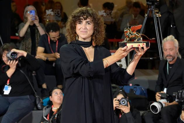 September 12, 2026, Venice Lido, Italy: May el-Toukhy poses with the Golden Lion for the Best Film Award for Woman Unknown at the Winners Photocall during the 83rd Venice International Film Festival at Sala Grande. Venice Lido Italy  - ZUMAs197 20260912_aaa_s197_570 Copyright: xMarioxCartellix