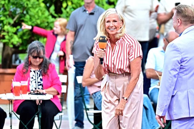 ZDF Fernsehgarten host Andrea Kiwi Kiewel during the ZDF entertainment show Fernsehgarten on September 13, 2026, in Mainz 20260913MWI149189