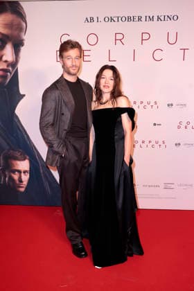Alexander Fehling and Hannah Herzsprung attend the premiere of *Corpus Delicti* on September 14, 2026, at the Delphi Filmpalast in Berlin, Germany. Movie premiere of *Corpus Delicti* in Berlin, Germany