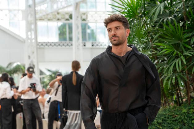 Singer Pablo Alboran walks the runway wearing a creation by Adolfo Dominguez during the presentation of the Croma collection for spring-summer 2027, part of Mercedes-Benz Fashion Week Madrid. The Malaga-born artist, who made an unexpected public reappearance after several weeks away from the stage due to pneumonia, became one of the highlights of the opening day by making a surprise appearance as a model in the Galician label s show. September 14,2026. (202609141074)