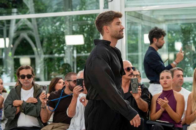 Singer Pablo Alboran walks the runway wearing a creation by Adolfo Dominguez during the presentation of the Croma collection for spring-summer 2027, part of Mercedes-Benz Fashion Week Madrid. The Malaga-born artist, who made an unexpected public reappearance after several weeks away from the stage due to pneumonia, became one of the highlights of the opening day by making a surprise appearance as a model in the Galician label s show. September 14,2026. (202609141082)
