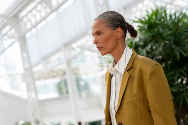 Models present creations from Adolfo Dominguez s Croma collection for spring-summer 2027 during Mercedes-Benz Fashion Week Madrid. Under the creative direction of Tiziana Domínguez, the Galician label, marking its 50th anniversary, remained faithful to its signature codes, showing pronounced asymmetry, scarves worked into both menswear and womenswear, sequins and textile appliques, alongside organic cotton denim dyed in tangerine tones and mini-pleated men s trousers. September 14,2026. (20260914920)
