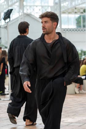Singer Pablo Alboran walks the runway wearing a creation by Adolfo Dominguez during the presentation of the Croma collection for spring-summer 2027, part of Mercedes-Benz Fashion Week Madrid. The Malaga-born artist, who made an unexpected public reappearance after several weeks away from the stage due to pneumonia, became one of the highlights of the opening day by making a surprise appearance as a model in the Galician label s show. September 14,2026. (202609141000)