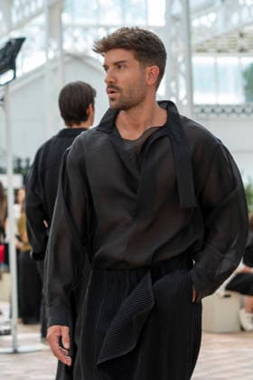 Singer Pablo Alboran walks the runway wearing a creation by Adolfo Dominguez during the presentation of the Croma collection for spring-summer 2027, part of Mercedes-Benz Fashion Week Madrid. The Malaga-born artist, who made an unexpected public reappearance after several weeks away from the stage due to pneumonia, became one of the highlights of the opening day by making a surprise appearance as a model in the Galician label s show. September 14,2026. (202609141001)