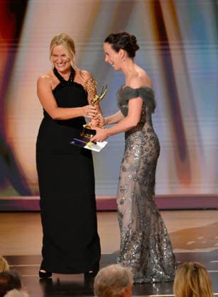Amy Poehler presents the Emmy Award to Kate O Flynn, who won the Outstanding Supporting Actress in a Comedy Series Award for Widow s Bay onstage during the 78th annual Primetime Emmy Awards at the Peacock Theater in Los Angeles on Monday, September 14, 2026.  LAP2026091437 JIMxRUYMEN