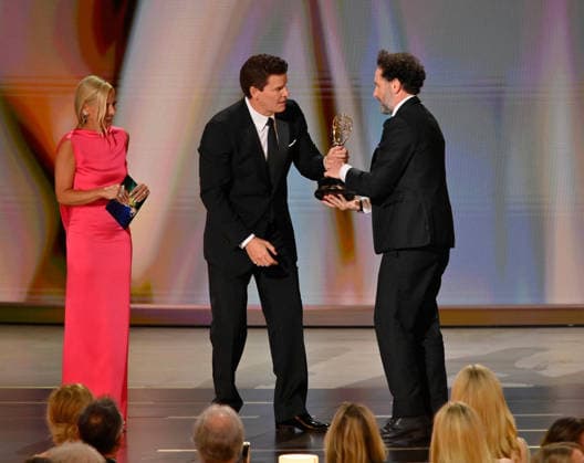 (L-R) Sarah Michelle Gellar and David Boreanaz present Matthew Rhys with the Outstanding Lead Actor in a Limited or Anthology Series or Movie Award for The Beast in Me onstage during the 78th annual Primetime Emmy Awards at the Peacock Theater in Los Angeles on Monday, September 14, 2026.  LAP2026091459 JIMxRUYMEN