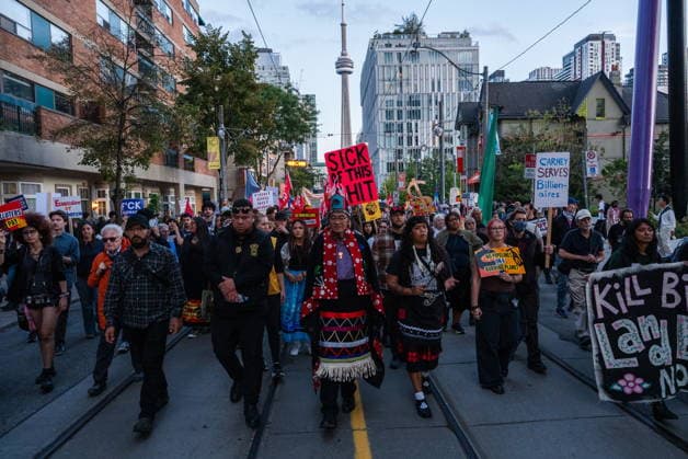 September 14, 2026, Toronto, On, CANADA: Protesters demonstrate against the Canada Investment Summit that Prime Minister Mark Carney is hosting in Toronto, on Monday, Sept. 14, 2026. Toronto CANADA  - ZUMAc35_ 20260914_zaf_c35_109 Copyright: xLauraxProctorx