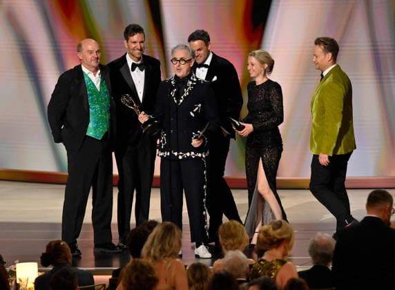 Cast and crew including Stephen Lambert, Mike Cotton, Sam Rees-Jones, Rosie Franks and Alan Cumming accept the Outstanding Reality Competition Program Award for The Traitors on stage during the 78th annual Primetime Emmy Awards at the Peacock Theater in Los Angeles on Monday, September 14, 2026.  LAP2026091490 JIMxRUYMEN