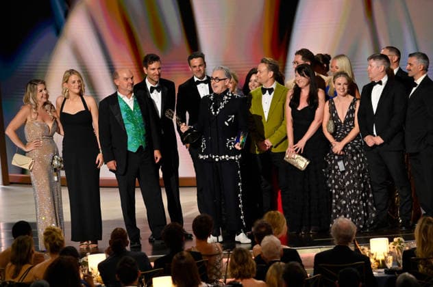 Cast and crew including Stephen Lambert, Mike Cotton, Sam Rees-Jones, Rosie Franks and Alan Cumming accept the Outstanding Reality Competition Program Award for The Traitors on stage during the 78th annual Primetime Emmy Awards at the Peacock Theater in Los Angeles on Monday, September 14, 2026.  LAP2026091494 JIMxRUYMEN