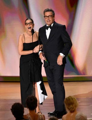 (L-R) Amanda Peet and Jon Hamm speak on stage during the 78th annual Primetime Emmy Awards at the Peacock Theater in Los Angeles on Monday, September 14, 2026.  LAP20260914110 JIMxRUYMEN