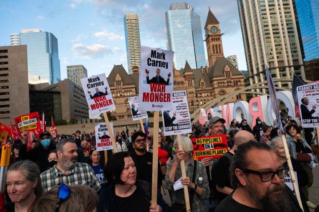 September 14, 2026, Toronto, On, CANADA: Protesters demonstrate against the Canada Investment Summit that Prime Minister Mark Carney is hosting in Toronto, on Monday, Sept. 14, 2026. Toronto CANADA  - ZUMAc35_ 20260914_zaf_c35_130 Copyright: xLauraxProctorx