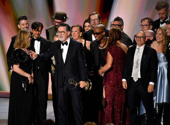 Cast and crew including Ariel Dumas, Opus Moreschi, Lauren Marcello, Sara Vilkomerson, Gabriel W Gronli, Stephen Colbert, Paul Dinello, Bjoern Stejskal, Tanya Michnevich Bracco, Matt Lappin, Michael R Brumm and Aaron Cohen accept the Outstanding Variety Series Award for The Late Show with Stephen Colbert on stage during the 78th annual Primetime Emmy Awards at the Peacock Theater in Los Angeles on Monday, September 14, 2026.  LAP20260914124 JIMxRUYMEN