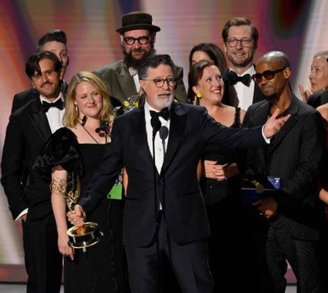 Cast and crew including Ariel Dumas, Opus Moreschi, Lauren Marcello, Sara Vilkomerson, Gabriel W Gronli, Stephen Colbert, Paul Dinello, Bjoern Stejskal, Tanya Michnevich Bracco, Matt Lappin, Michael R Brumm and Aaron Cohen accept the Outstanding Variety Series Award for The Late Show with Stephen Colbert on stage during the 78th annual Primetime Emmy Awards at the Peacock Theater in Los Angeles on Monday, September 14, 2026.  LAP20260914127 JIMxRUYMEN