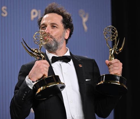 Matthew Rhys holds the Emmy for Outstanding Lead Actor in a Comedy Series Award for Widow s Bay and Outstanding Lead Actor in a Limited or Anthology Series or Movie Award for The Beast in Me, backstage during the 78th annual Primetime Emmy Awards at the Peacock Theater in Los Angeles on Monday, September 14, 2026.  LAP20260914207 CHRISxCHEW