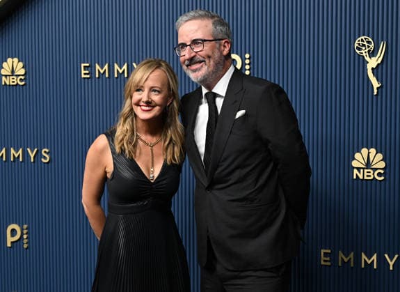 Liz Stanton and John Oliver arrive for the 78th annual Primetime Emmy Awards at the Peacock Theater in Los Angeles on Monday, September 14, 2026.  LAP20260914878 JohnxMcCoy