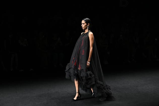BEIJING, CHINA - SEPTEMBER 14: Models display fashion designs by Daniel IJ Uys and Claudine Uys during the SS2027 Beijing Fashion Week at Wangfujing on September 14, 2026 in Beijing, China. The collection, themed Nocturnal Monarch Butterfly, draws inspiration from butterflies dancing in a garden after nightfall.  Copyright: xChinaxNewsxServicex 111666773889