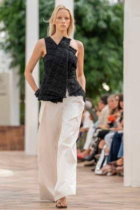 Models present creations from Simorra s FOLD IN collection for spring-summer 2027 during Mercedes-Benz Fashion Week Madrid. The Barcelona-based label, founded in 1978 by Javier Simorra, explores shapes, curves and the fold as a central element in this collection, with garments that adapt to the body and celebrate a beauty that resists rigidity. September 14,2026. (202609141499)
