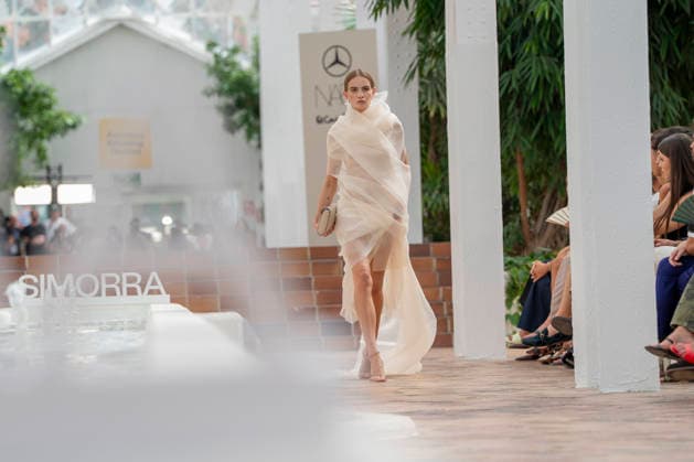 Models present creations from Simorra s FOLD IN collection for spring-summer 2027 during Mercedes-Benz Fashion Week Madrid. The Barcelona-based label, founded in 1978 by Javier Simorra, explores shapes, curves and the fold as a central element in this collection, with garments that adapt to the body and celebrate a beauty that resists rigidity. September 14,2026. (202609141368)