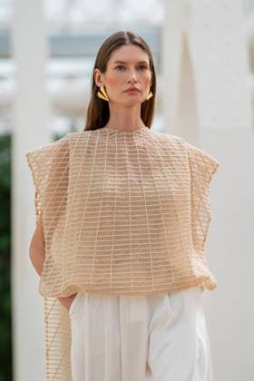 Models present creations from Simorra s FOLD IN collection for spring-summer 2027 during Mercedes-Benz Fashion Week Madrid. The Barcelona-based label, founded in 1978 by Javier Simorra, explores shapes, curves and the fold as a central element in this collection, with garments that adapt to the body and celebrate a beauty that resists rigidity. September 14,2026. (202609141394)