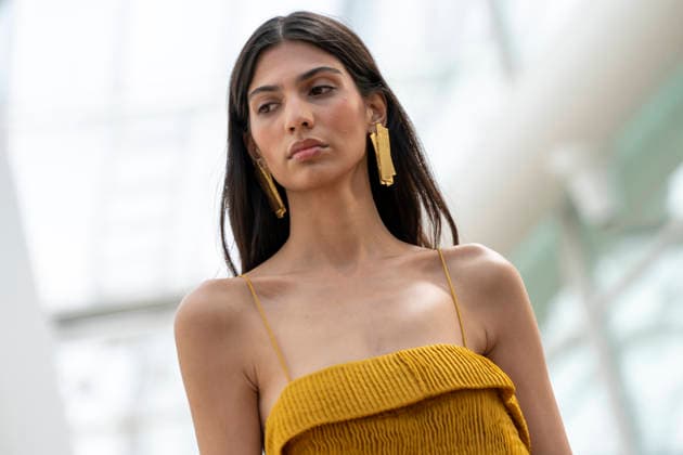 Models present creations from Simorra s FOLD IN collection for spring-summer 2027 during Mercedes-Benz Fashion Week Madrid. The Barcelona-based label, founded in 1978 by Javier Simorra, explores shapes, curves and the fold as a central element in this collection, with garments that adapt to the body and celebrate a beauty that resists rigidity. September 14,2026. (202609141447)
