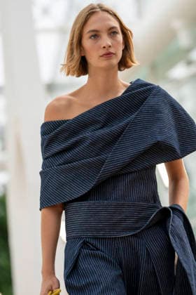 Models present creations from Simorra s FOLD IN collection for spring-summer 2027 during Mercedes-Benz Fashion Week Madrid. The Barcelona-based label, founded in 1978 by Javier Simorra, explores shapes, curves and the fold as a central element in this collection, with garments that adapt to the body and celebrate a beauty that resists rigidity. September 14,2026. (202609141540)