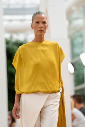 Models present creations from Simorra s FOLD IN collection for spring-summer 2027 during Mercedes-Benz Fashion Week Madrid. The Barcelona-based label, founded in 1978 by Javier Simorra, explores shapes, curves and the fold as a central element in this collection, with garments that adapt to the body and celebrate a beauty that resists rigidity. September 14,2026. (202609141584)