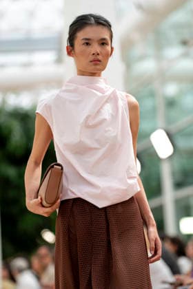 Models present creations from Simorra s FOLD IN collection for spring-summer 2027 during Mercedes-Benz Fashion Week Madrid. The Barcelona-based label, founded in 1978 by Javier Simorra, explores shapes, curves and the fold as a central element in this collection, with garments that adapt to the body and celebrate a beauty that resists rigidity. September 14,2026. (202609141601)