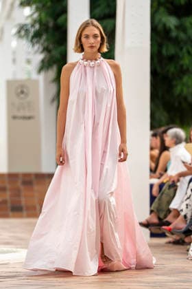 Models present creations from Simorra s FOLD IN collection for spring-summer 2027 during Mercedes-Benz Fashion Week Madrid. The Barcelona-based label, founded in 1978 by Javier Simorra, explores shapes, curves and the fold as a central element in this collection, with garments that adapt to the body and celebrate a beauty that resists rigidity. September 14,2026. (202609141666)
