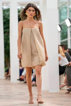 Models present creations from Simorra s FOLD IN collection for spring-summer 2027 during Mercedes-Benz Fashion Week Madrid. The Barcelona-based label, founded in 1978 by Javier Simorra, explores shapes, curves and the fold as a central element in this collection, with garments that adapt to the body and celebrate a beauty that resists rigidity. September 14,2026. (202609141556)