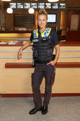 ABB HAFENKANTE Rhea Harder Vennewald, actress in a police uniform, at a photo shoot marking the start of the 20th anniversary season and the 500th episode of the ZDF TV series *Notruf Hafenkante* on the original set of PK 21 at Studio Hamburg on September 16, 2002026 in Hamburg