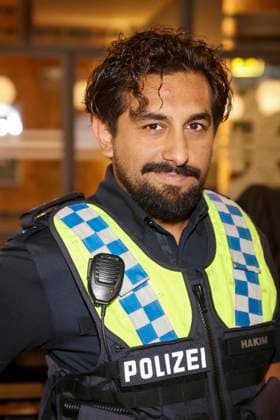 ABB HAFENKANTE Zejhun Demirov, actor in police uniform, at a photo op marking the start of the 20th anniversary season and the 500th episode of the ZDF TV series *Notruf Hafenkante* on the original set of PK 21 at Studio Hamburg on September 16, 2026 in Hamburg