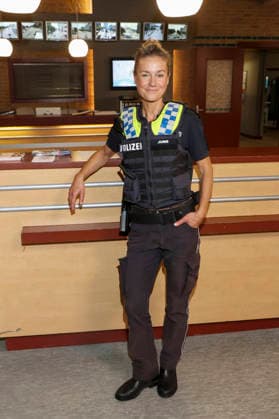 ABB HAFENKANTE Rhea Harder Vennewald, actress in a police uniform, at a photo shoot to mark the start of the 20th anniversary season and the 500th episode of the ZDF TV series *Notruf Hafenkante* on the original set of PK 21 at Studio Hamburg on September 16, 2002026 in Hamburg