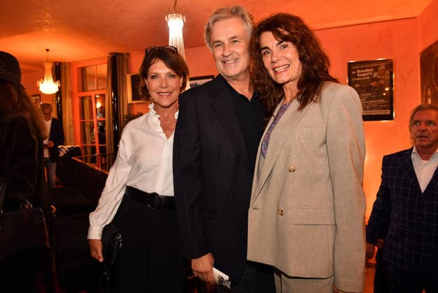 Janina Hartwig, Timothy Peach, and Nicola Tiggeler at the premiere of *Oktoberfest: A Musical—An Almost True Story* on September 16, 2026, at the Komoedie Bayerischer Hof in Munich. Janina Hartwig, Timothy Peach, and Nicola Tiggeler attend the premiere of *Oktoberfest: A Musical—An Almost True Story*