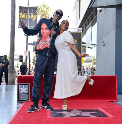 Actress Nia Long is joined American rapper and actor Snoop Dogg during an unveiling ceremony honoring her with the 2,857th star on the Hollywood Walk of Fame in Los Angeles on Wednesday, September 16, 2026.  LAP2026091612 JIMxRUYMEN
