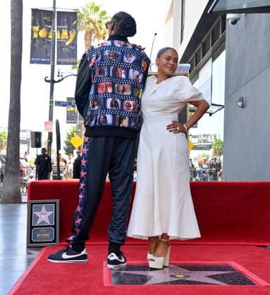 Actress Nia Long is joined by American rapper and actor Snoop Dogg during an unveiling ceremony honoring her with the 2,857th star on the Hollywood Walk of Fame in Los Angeles on Wednesday, September 16, 2026. Snoop Dogg s jacket displays still from the many movie roles Long has performed in.  LAP2026091615 JIMxRUYMEN